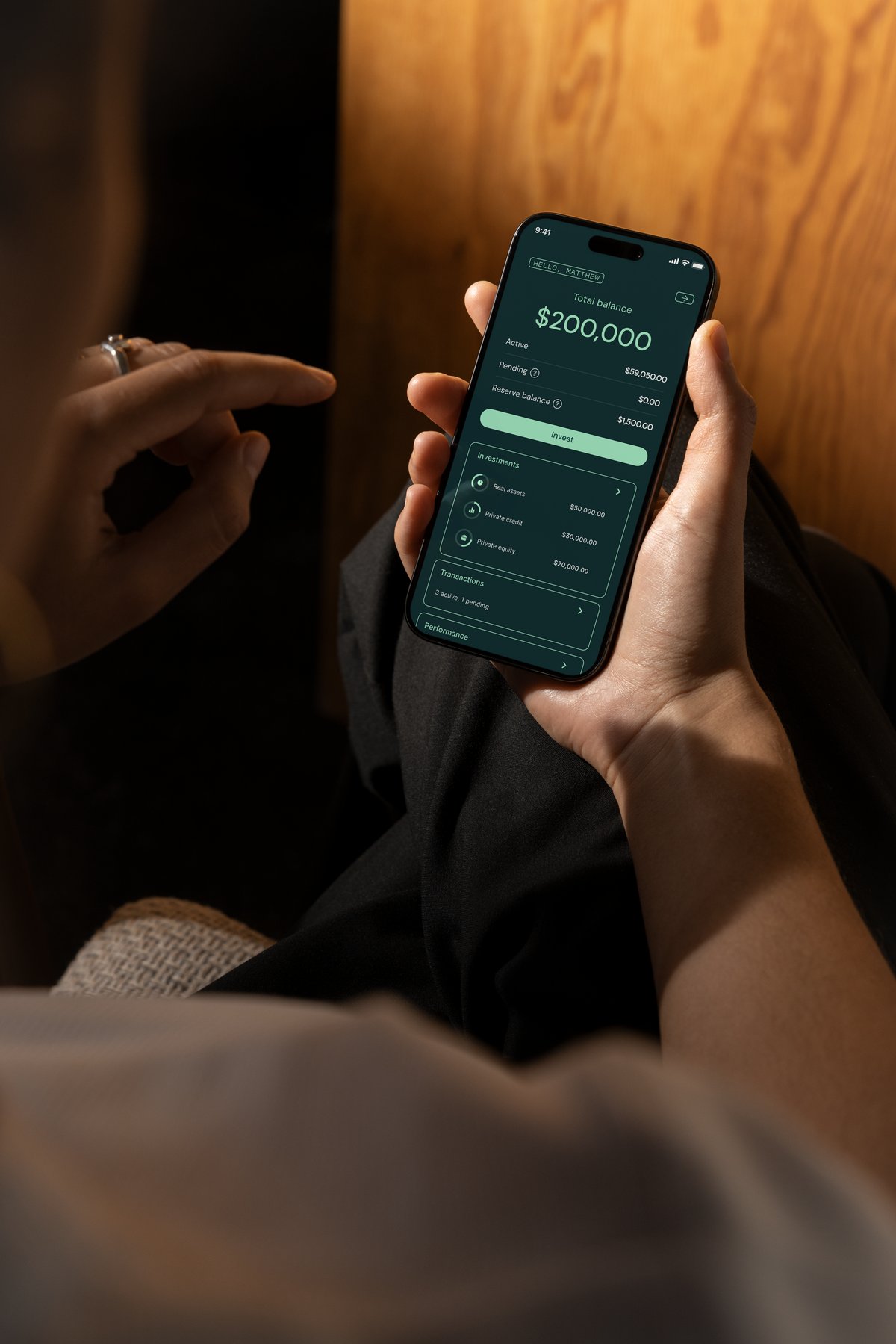 Person reviewing portfolio on phone